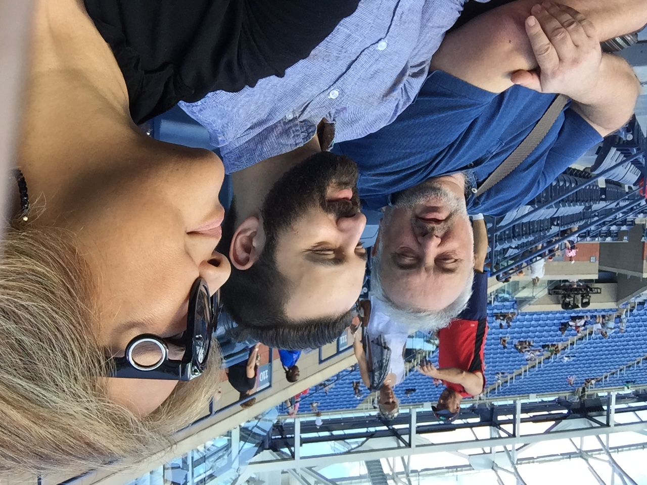 A group of people sitting in a stadiumAI-generated content may be incorrect.