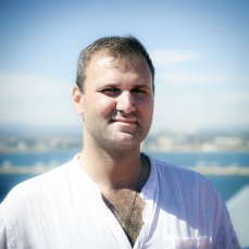 A person in a white shirtAI-generated content may be incorrect.