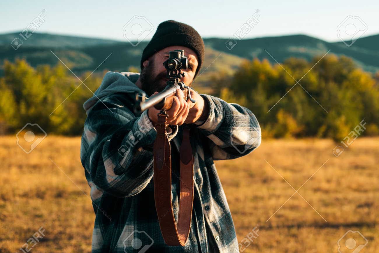 https://previews.123rf.com/images/tverdohlib/tverdohlib2304/tverdohlib230404120/203597826-hunter-with-shotgun-gun-on-hunt-hunting-gear-hunting-supplies-and-equipment.jpg